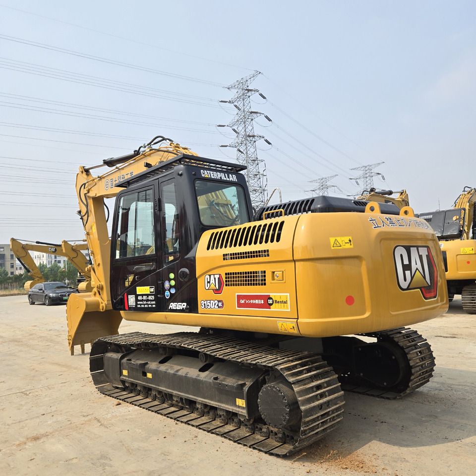 2021 Caterpillar 315D2GC crawler excavator, rear three-quarter view