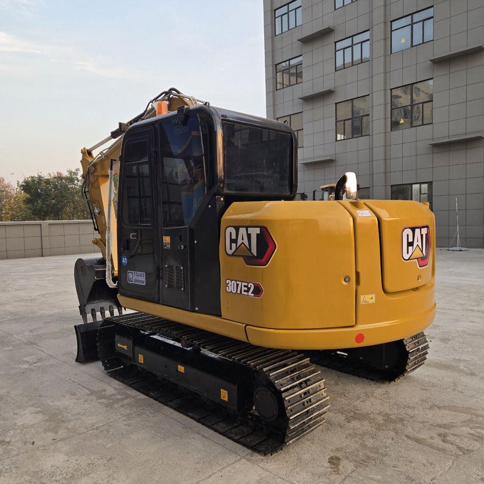 2024 Caterpillar 307E2 mini excavator, rear three-quarter view 2024 Caterpillar 307E2 mini excavator, rear three-quarter view