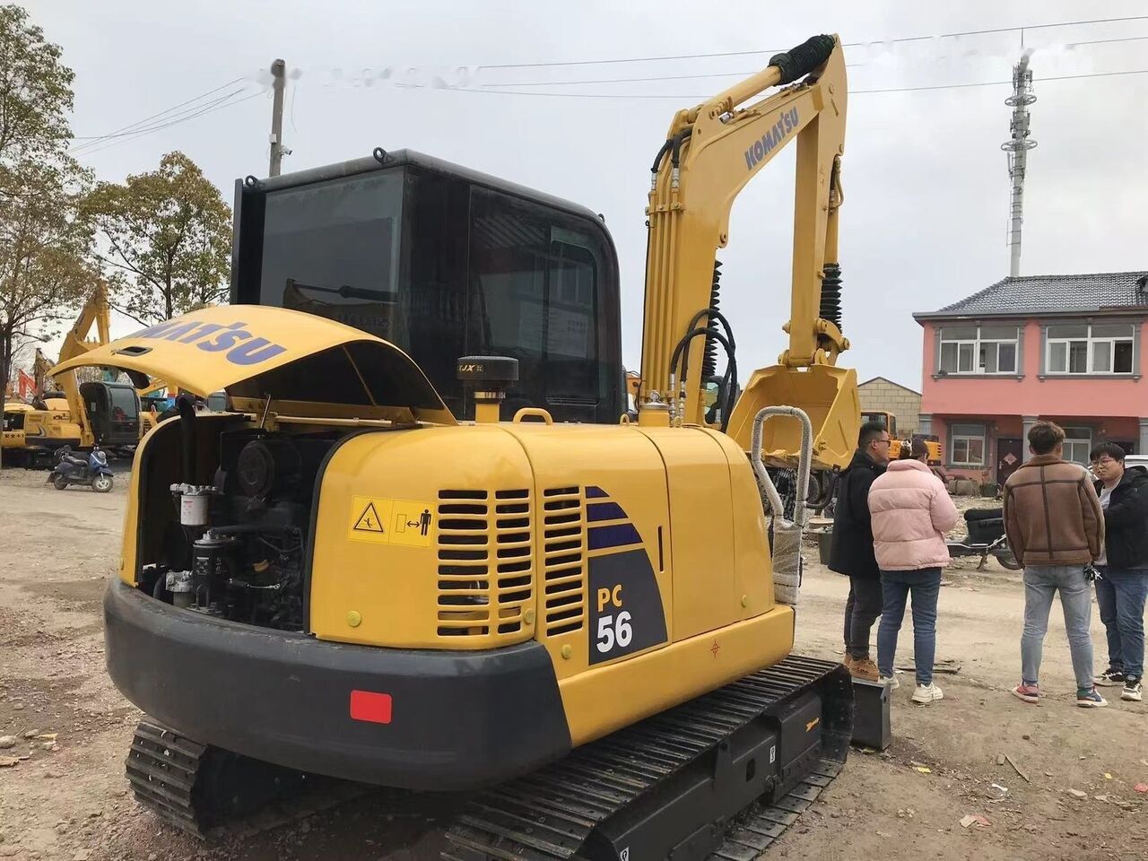 2021 Komatsu PC56 mini excavator, rear three-quarter view 2021 Komatsu PC56 mini excavator, rear three-quarter view