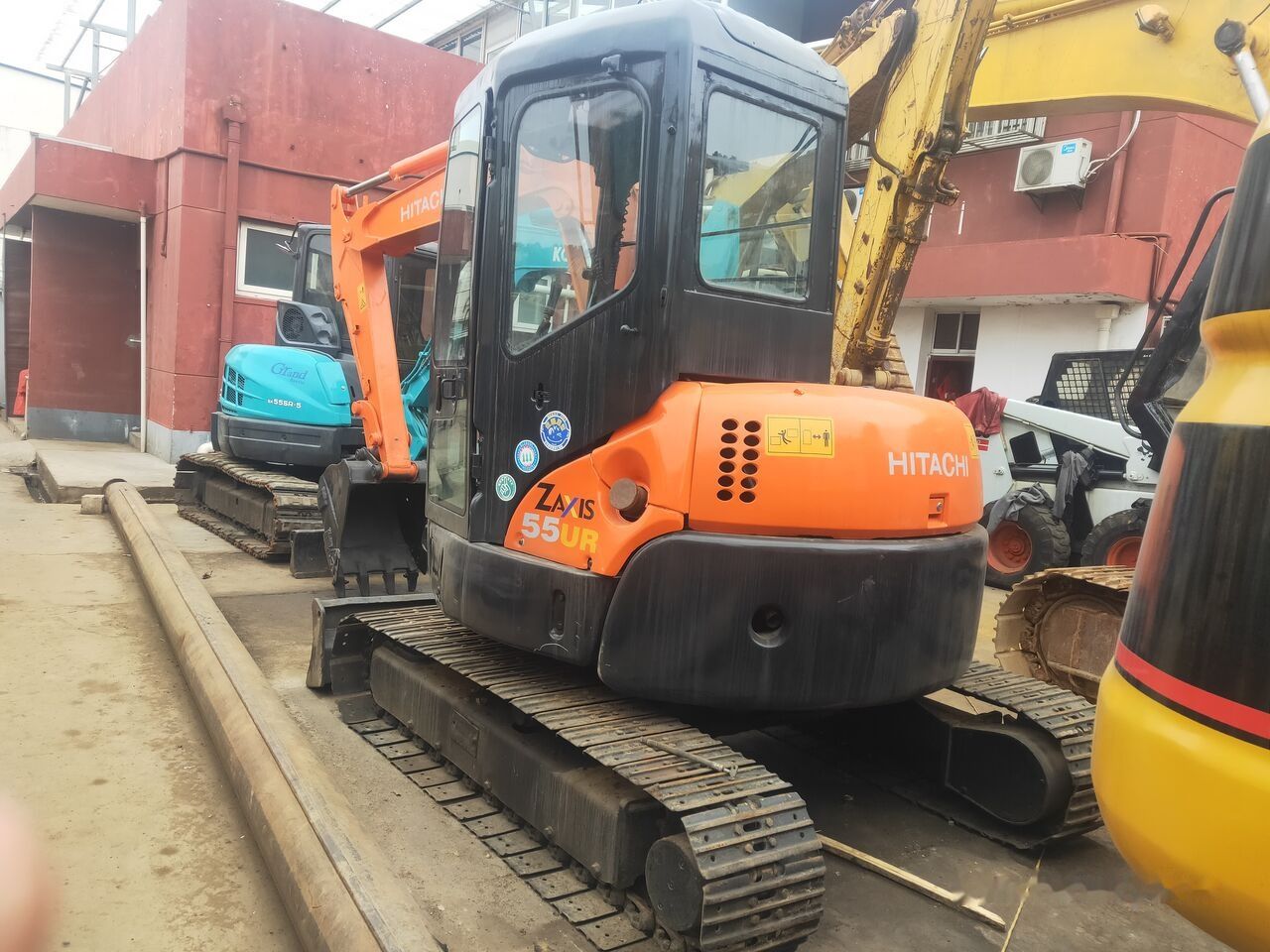 2019 Hitachi Zaxis 55UR mini excavator, rear three-quarter view