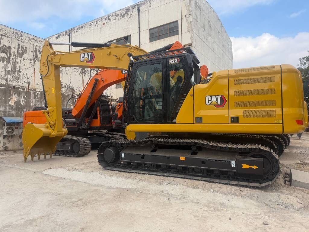 2024 Caterpillar 323 crawler excavator, side profile view