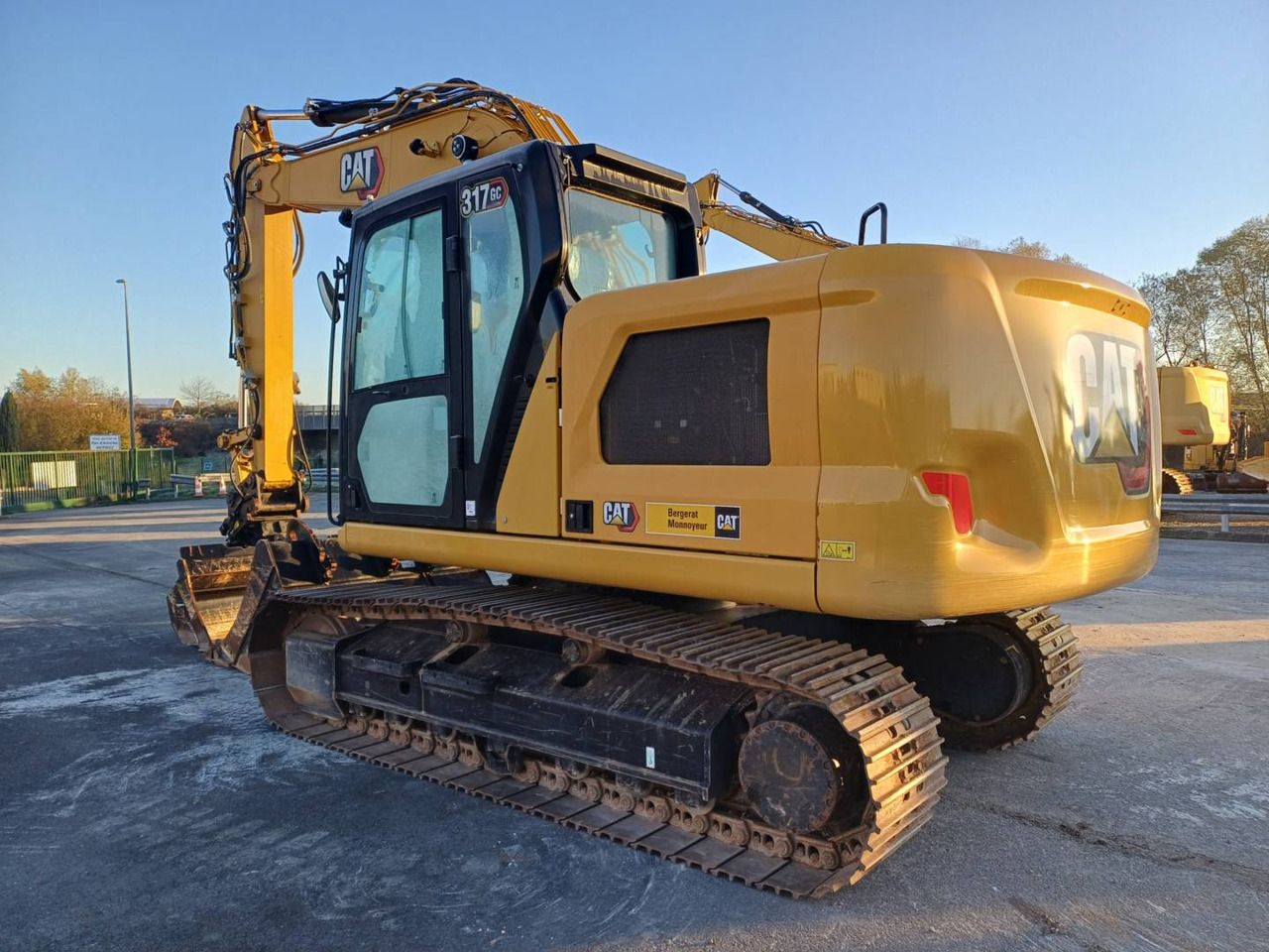 2023 Caterpillar 317 GC crawler excavator, rear three-quarter view 2023 Caterpillar 317 GC crawler excavator, rear three-quarter view