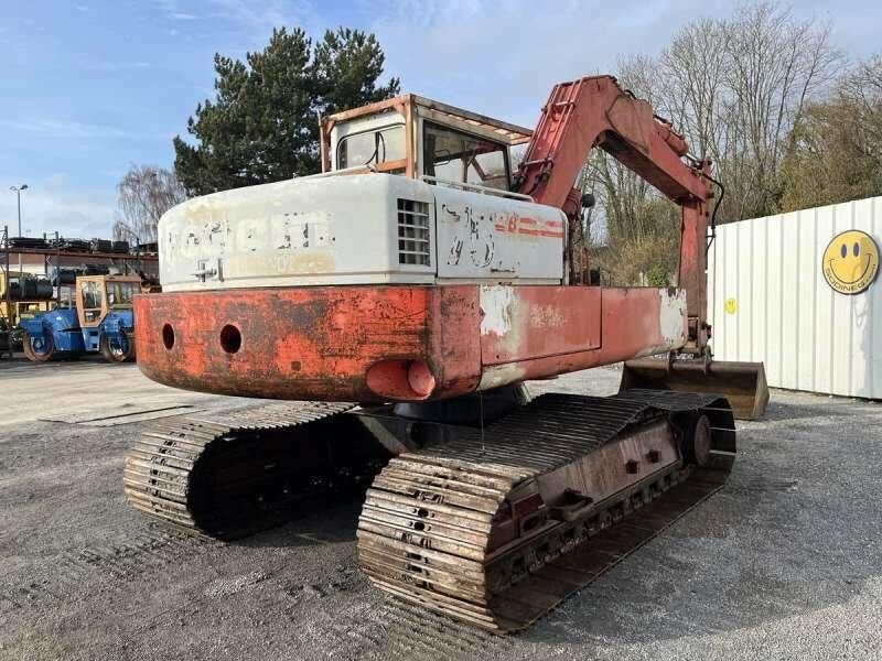 1985 Poclain 75CKB crawler excavator, rear three-quarter view 1985 Poclain 75CKB crawler excavator, rear three-quarter view
