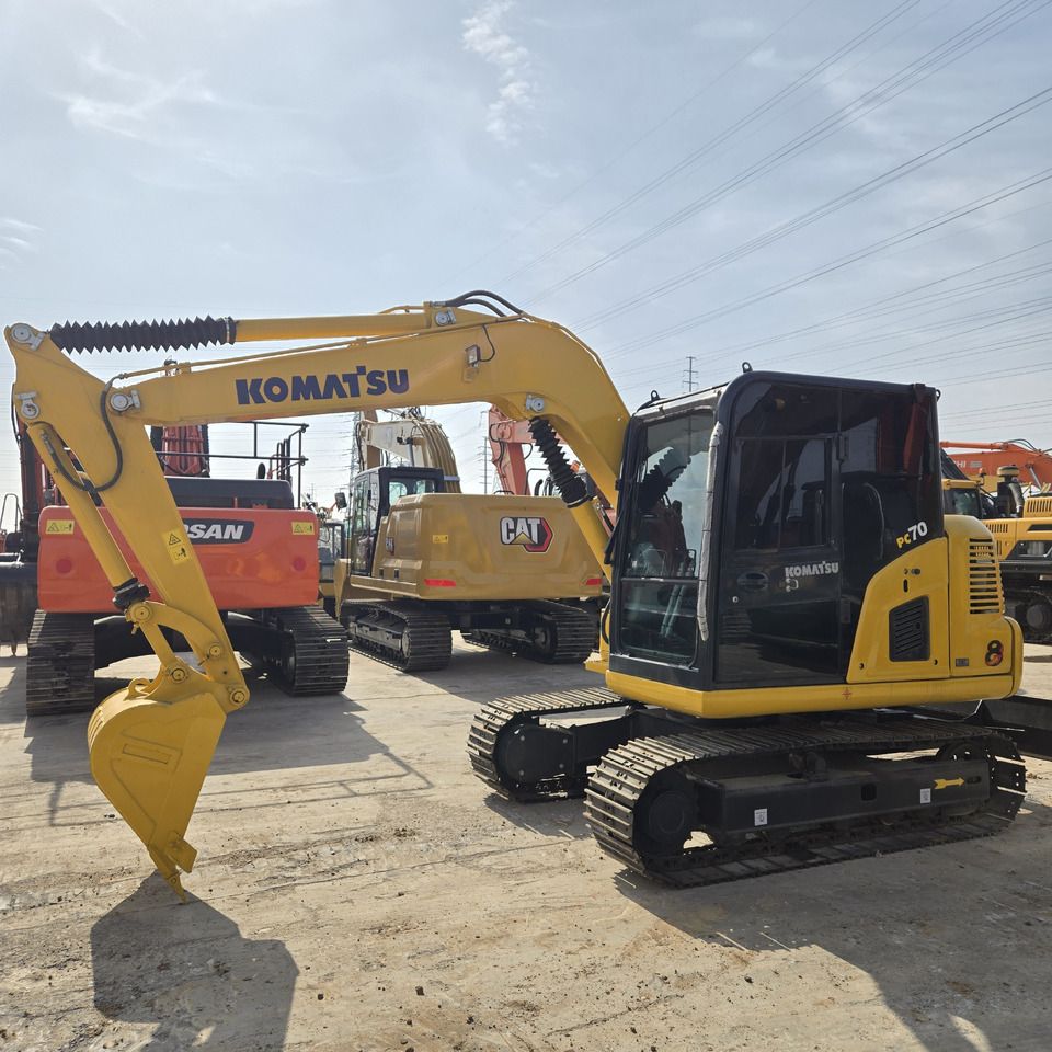 Komatsu PC70-8 mini excavator, side view Komatsu PC70-8 mini excavator, side view
