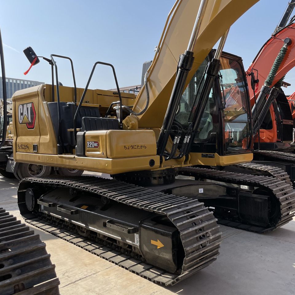2023 Caterpillar 320GC crawler excavator, side view 2023 Caterpillar 320GC crawler excavator, side view