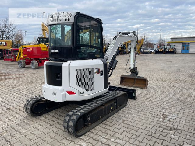 2022 Caterpillar 303.5CR-07 mini excavator, rear three-quarter view 2022 Caterpillar 303.5CR-07 mini excavator, rear three-quarter view