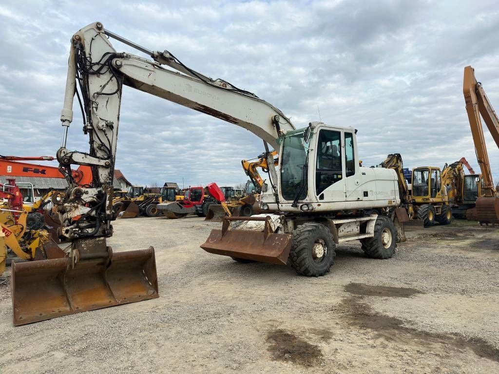 2009 Caterpillar M316D wheel excavator, side view 2009 Caterpillar M316D wheel excavator, side view