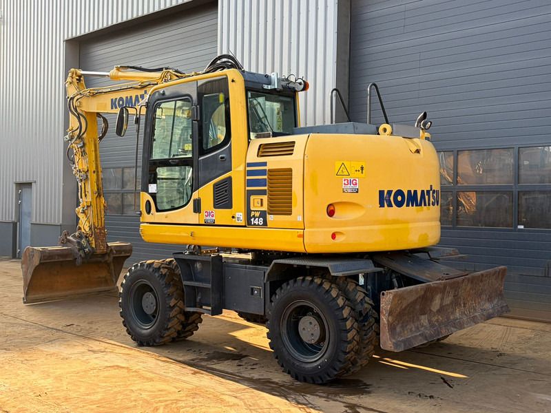 2017 Komatsu PW148-10 wheel excavator, rear three-quarter view
