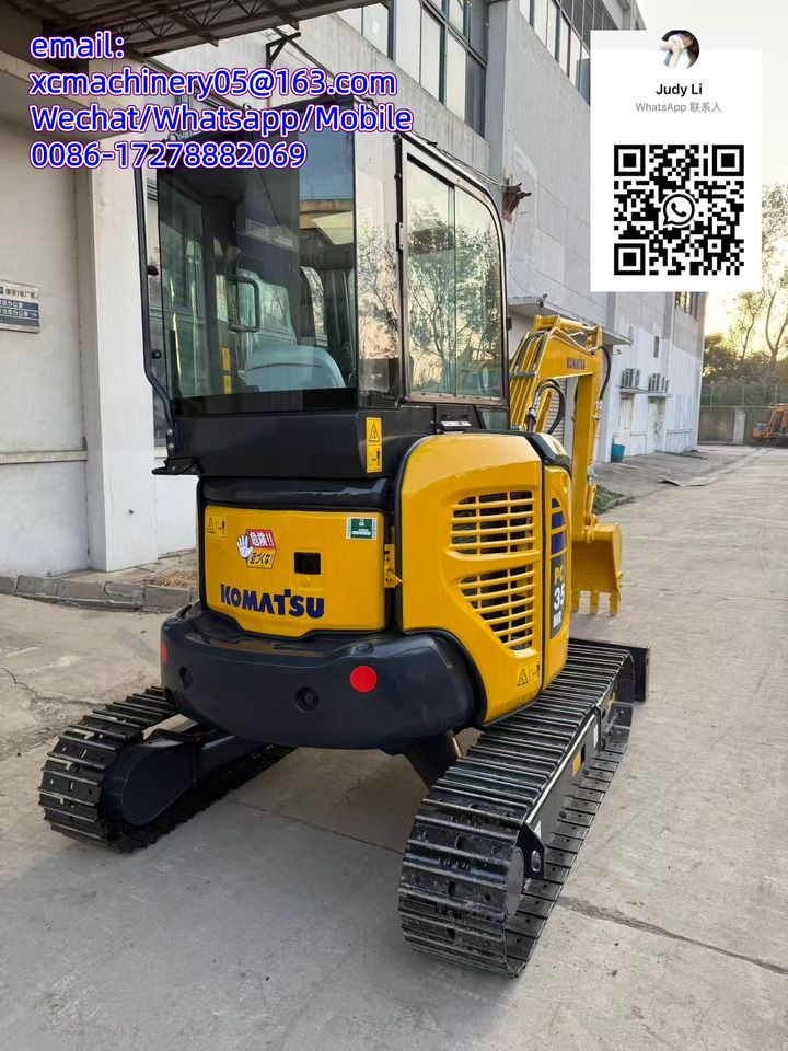 2021 Komatsu PC35 MR mini excavator, rear three-quarter view 2021 Komatsu PC35 MR mini excavator, rear three-quarter view