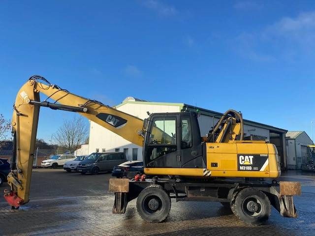 2012 Caterpillar M318D MH material handler, side view 2012 Caterpillar M318D MH material handler, side view