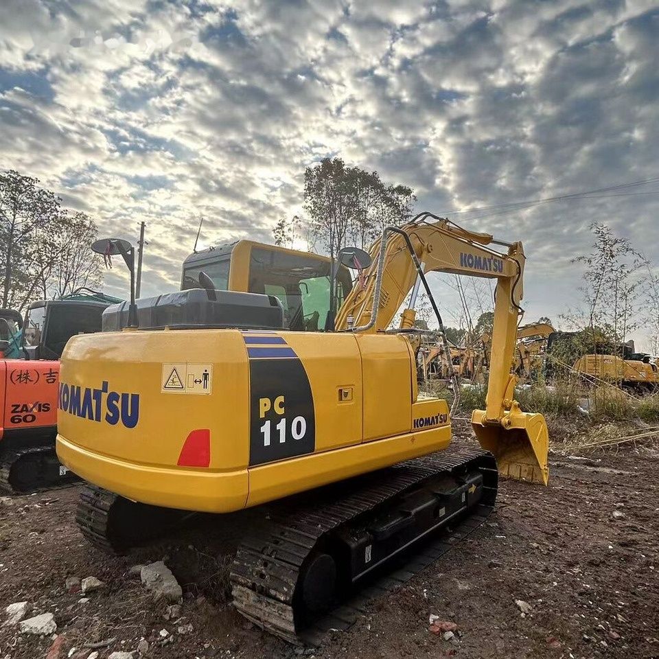 Komatsu PC110 crawler excavator, rear three-quarter view