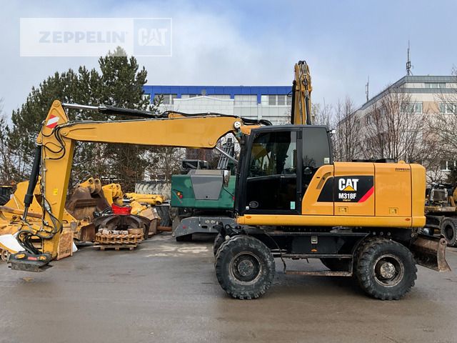2015 Caterpillar M318F wheel excavator side view 2015 Caterpillar M318F wheel excavator side view