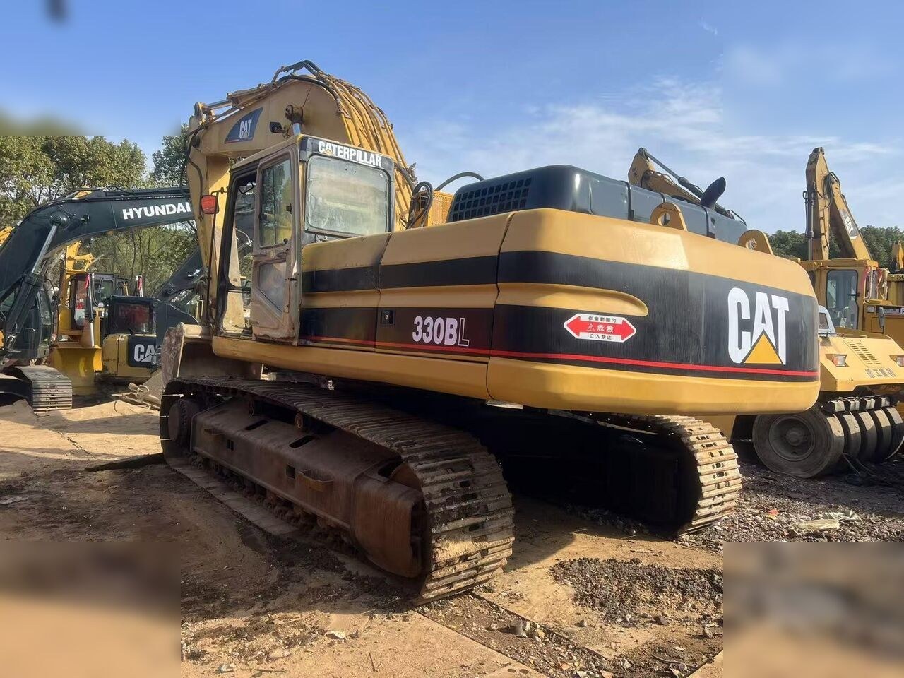 2024 Caterpillar 330BL crawler excavator, rear three-quarter view 2024 Caterpillar 330BL crawler excavator, rear three-quarter view
