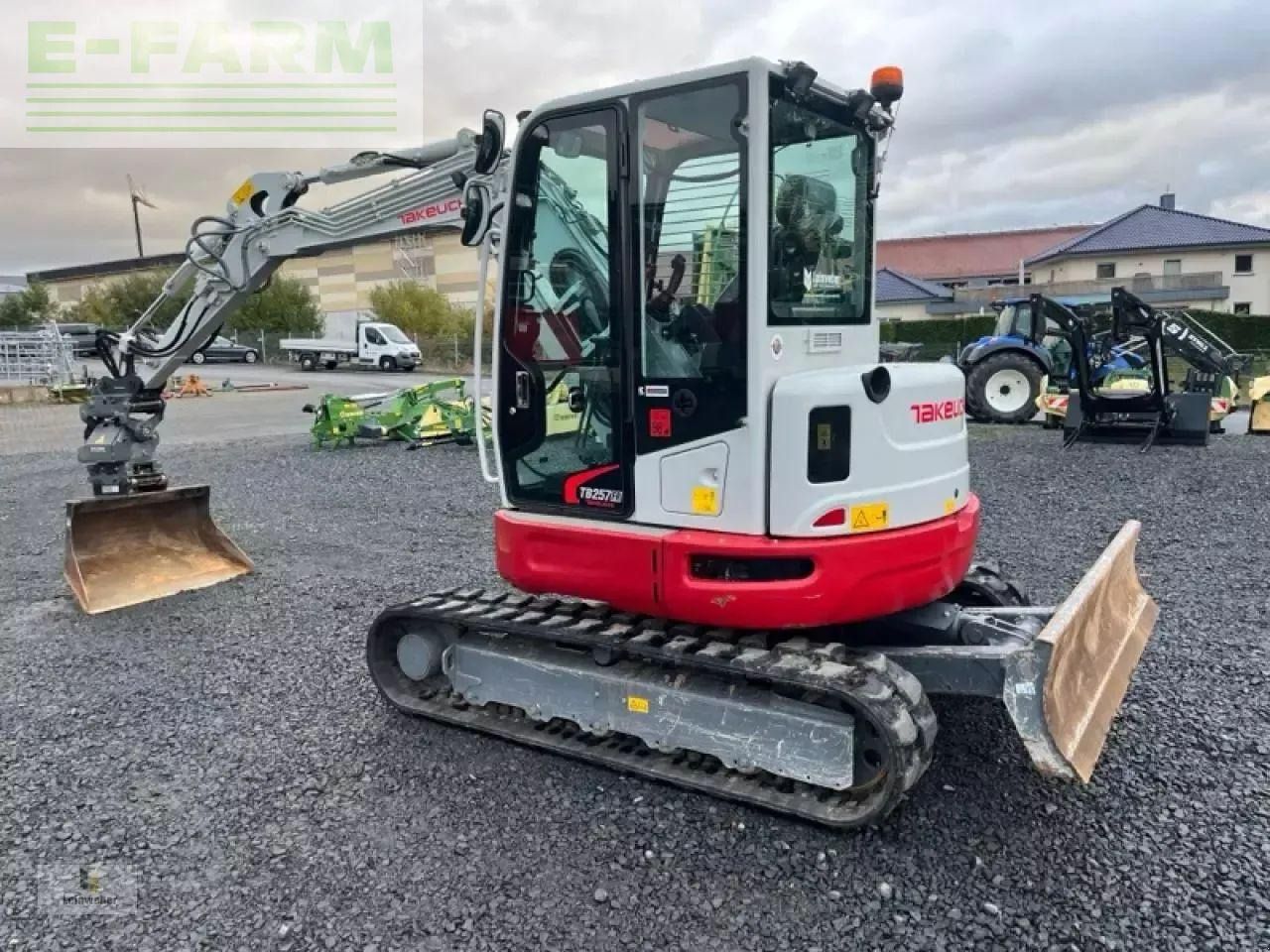 2023 Takeuchi TB257FR V1 mini excavator, rear three-quarter view