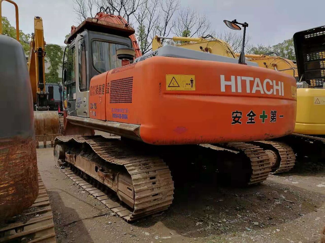 2023 Hitachi ZX210LC-5G excavator, rear three-quarter view 2023 Hitachi ZX210LC-5G excavator, rear three-quarter view