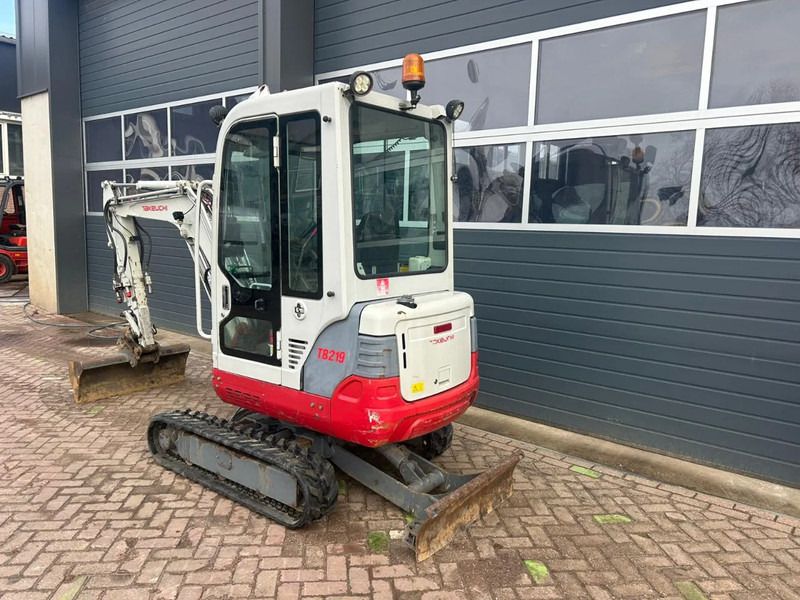2011 Takeuchi TB219 mini excavator, rear three-quarter view 2011 Takeuchi TB219 mini excavator, rear three-quarter view
