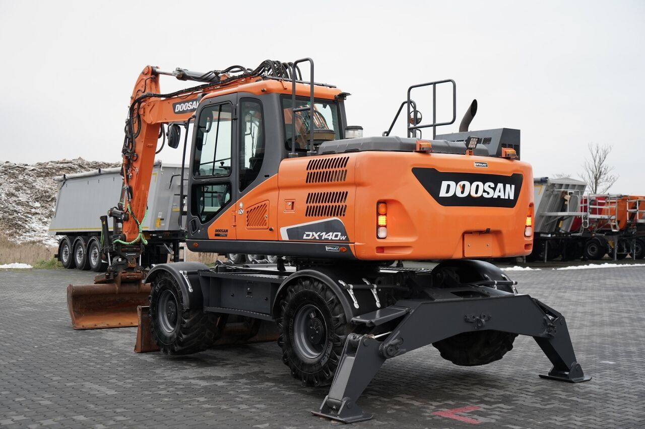 2019 Doosan DX140W Pelle sur roues
