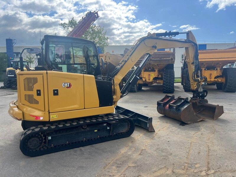 2022 Caterpillar 306CR mini excavator, rear three-quarter view 2022 Caterpillar 306CR mini excavator, rear three-quarter view