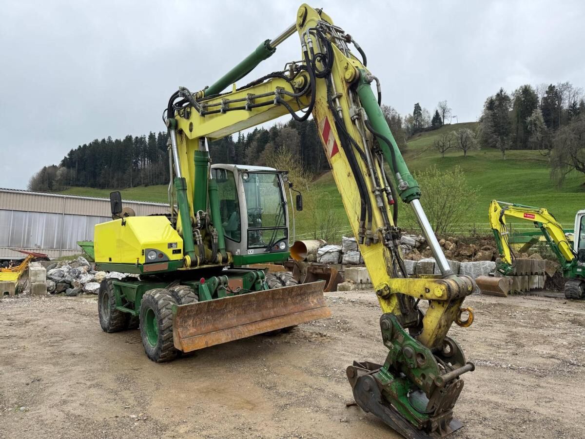 2006 Atlas 1905 wheel excavator, front three-quarter view 2006 Atlas 1905 wheel excavator, front three-quarter view