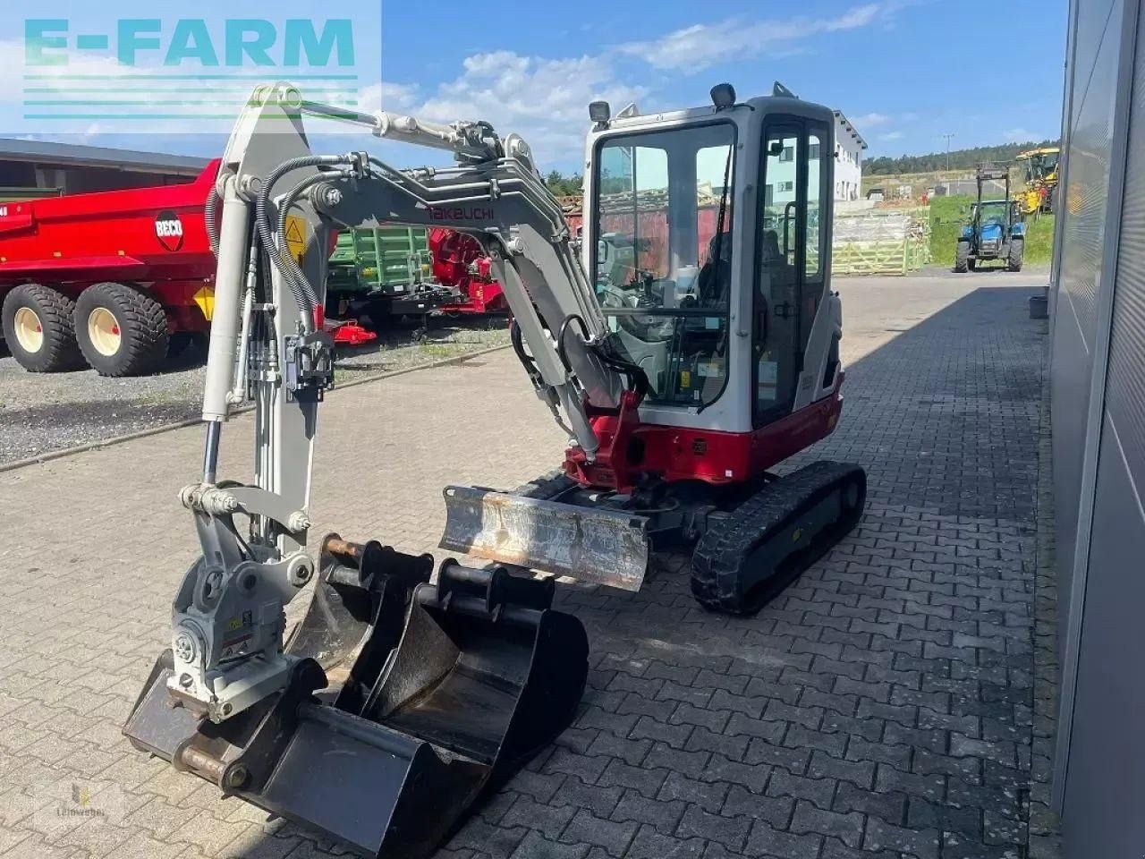 2022 Takeuchi TB225 V4 mini excavator, front three-quarter view