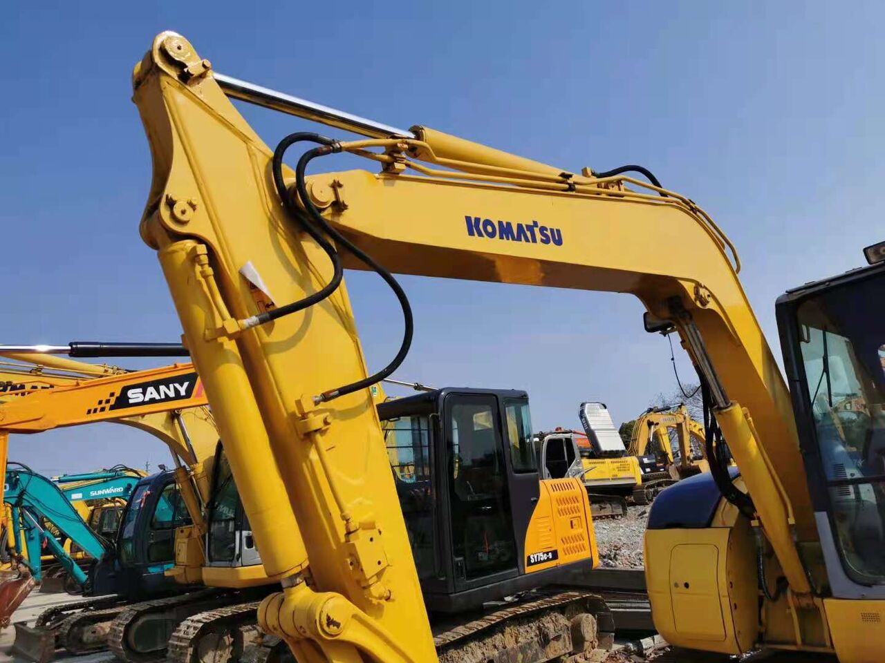 2023 Komatsu PC78US-6 excavator, close-up of boom and cab 2023 Komatsu PC78US-6 excavator, close-up of boom and cab