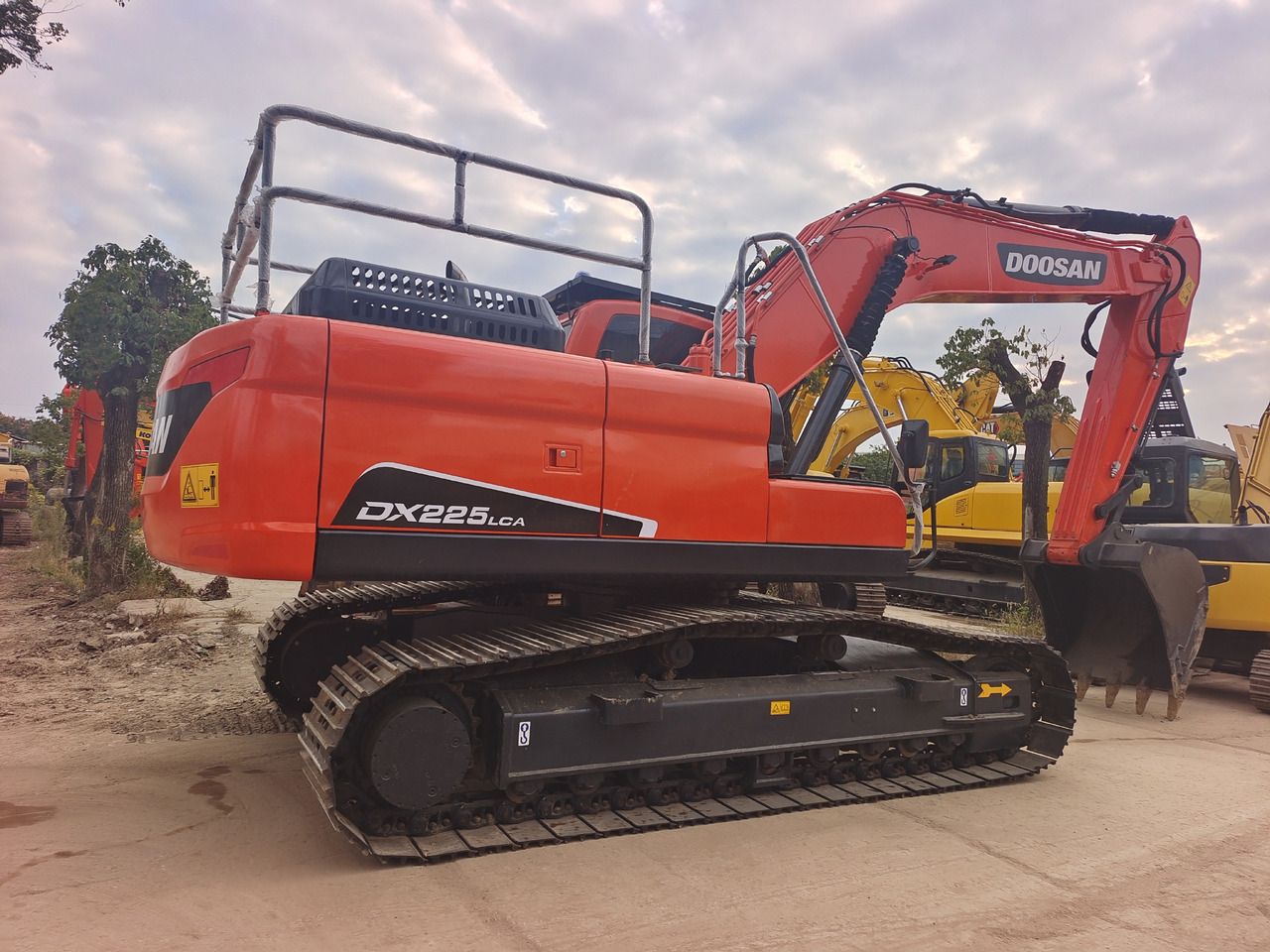 2024 Doosan DX225LCA crawler excavator rear three-quarter view 2024 Doosan DX225LCA crawler excavator rear three-quarter view