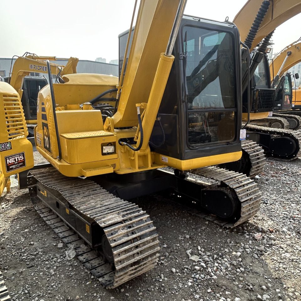 2024 Komatsu PC70-8 mini excavator, rear three-quarter view