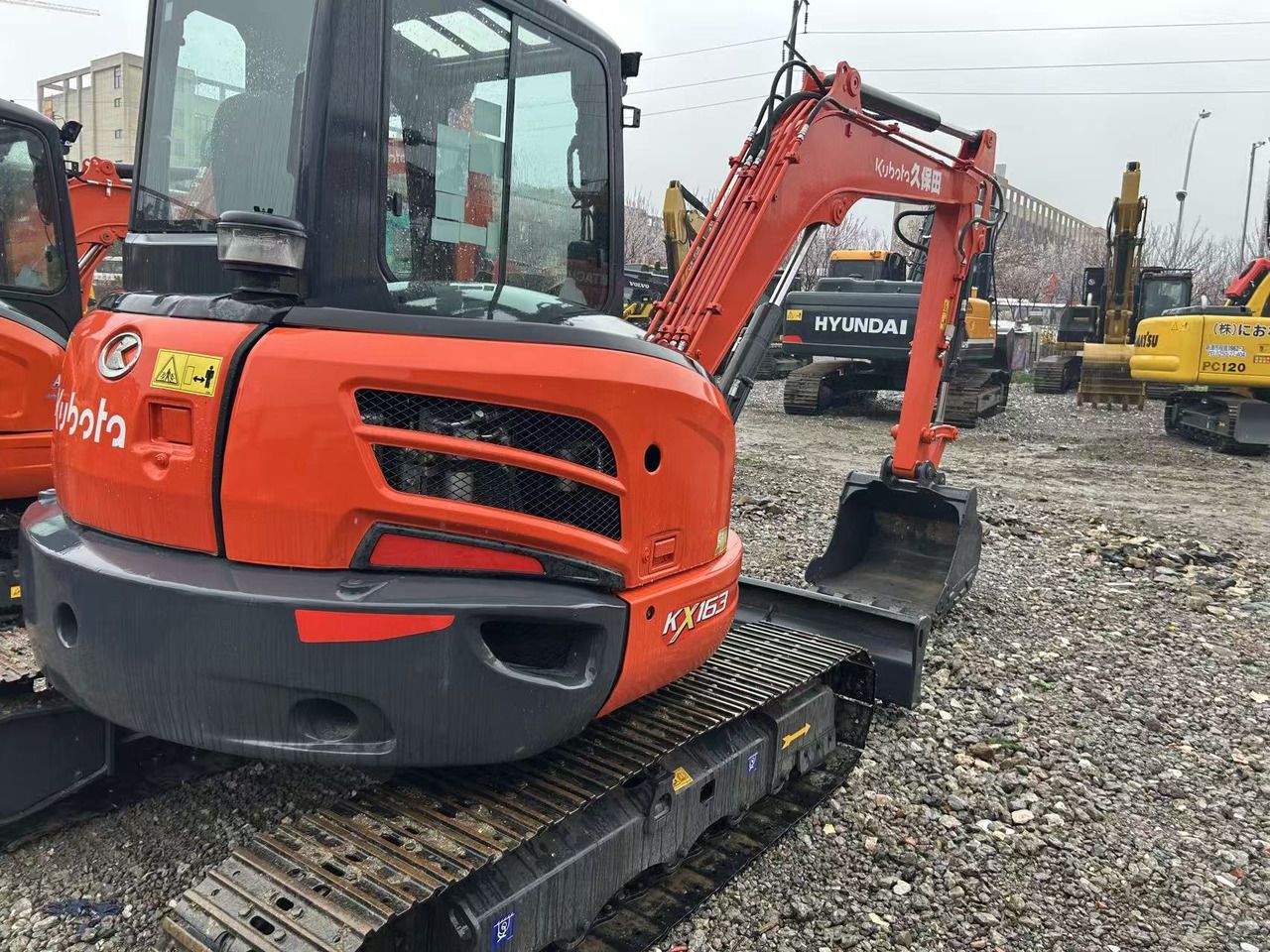 2024 Kubota KX163 mini excavator, rear three-quarter view