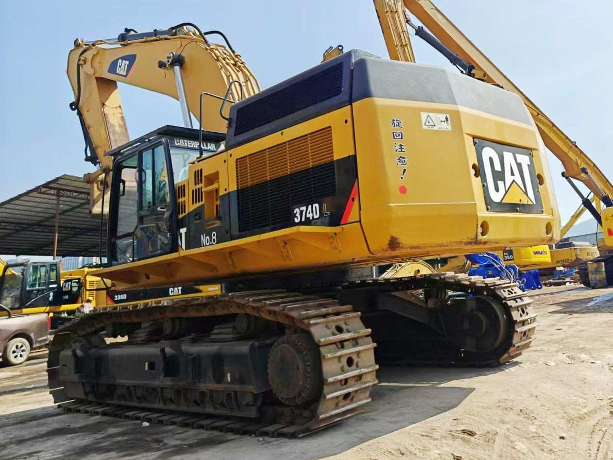 2019 Caterpillar 374DL crawler excavator, rear three-quarter view 2019 Caterpillar 374DL crawler excavator, rear three-quarter view