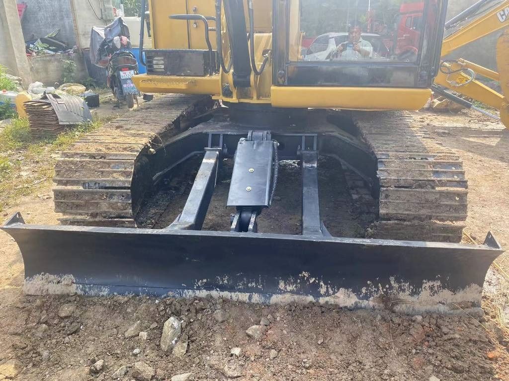 2024 Caterpillar 308E2 mini excavator front view with blade