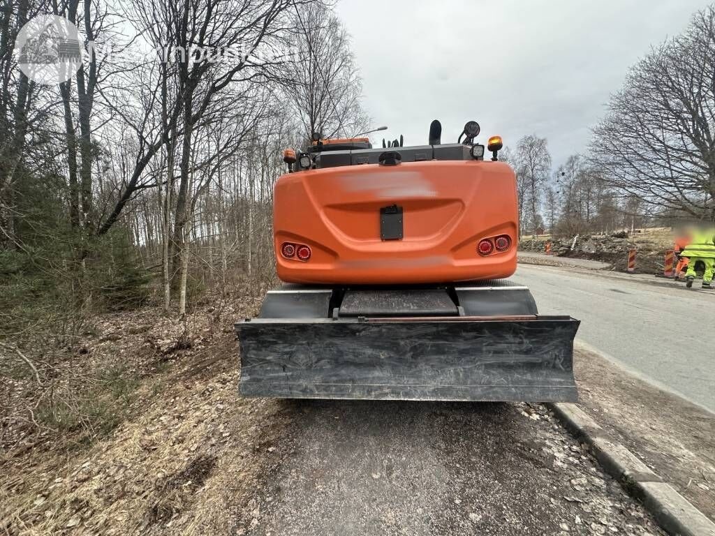 2018 Hitachi ZX140W-6 wheel excavator, rear view 2018 Hitachi ZX140W-6 wheel excavator, rear view