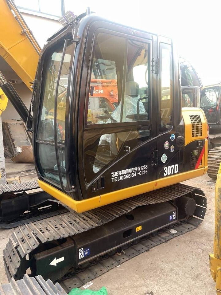 2020 Caterpillar 307D mini excavator cab and side view 2020 Caterpillar 307D mini excavator cab and side view