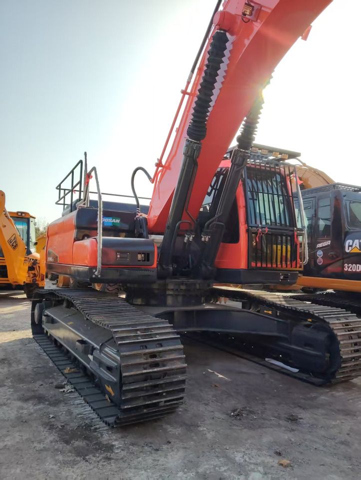 Doosan DX345 crawler excavator, side view Doosan DX345 crawler excavator, side view