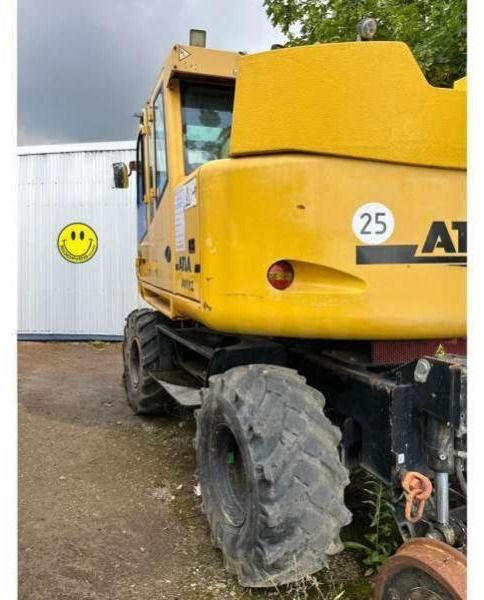 2013 Atlas 1404 ZW wheel excavator rear three-quarter view