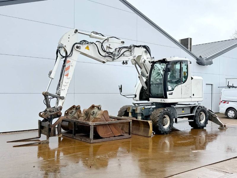 2012 Liebherr A914 COMPACT wheel excavator side view 2012 Liebherr A914 COMPACT wheel excavator side view