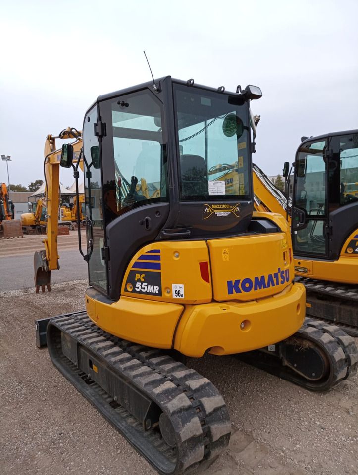 2024 Komatsu PC55MR-5 mini excavator, rear three-quarter view 2024 Komatsu PC55MR-5 mini excavator, rear three-quarter view