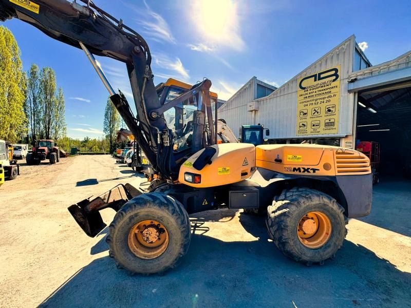 2008 Mecalac 12MXT wheel excavator side view 2008 Mecalac 12MXT wheel excavator side view
