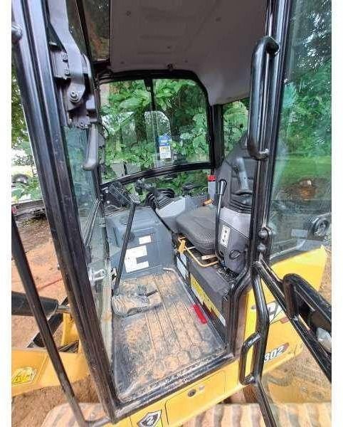 2023 Caterpillar 302 mini excavator cab interior view