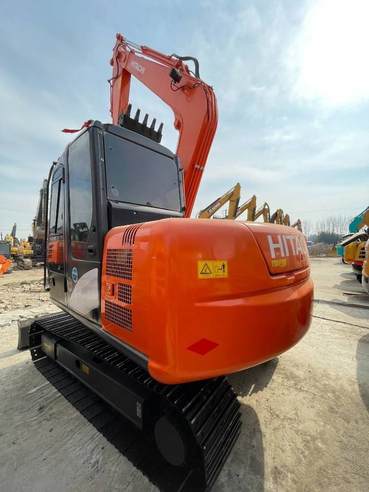 2025 Hitachi ZX70 mini excavator rear three-quarter view 2025 Hitachi ZX70 mini excavator rear three-quarter view