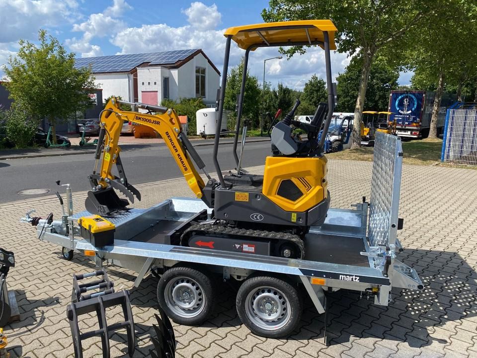 Berger Kraus BK1000JSR mini excavator on a trailer, side view Berger Kraus BK1000JSR mini excavator on a trailer, side view