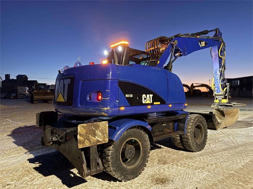 2014 Caterpillar M313D wheel excavator rear three-quarter view 2014 Caterpillar M313D wheel excavator rear three-quarter view