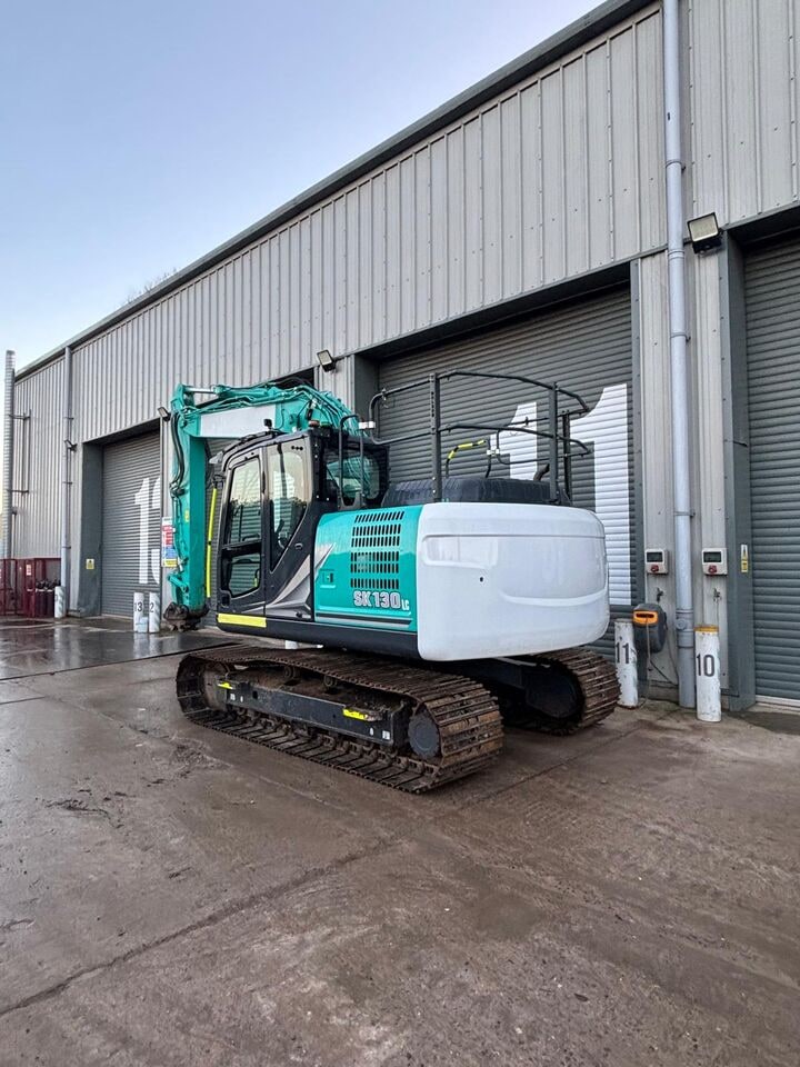 2022 Kobelco SK130LC-11 crawler excavator, rear three-quarter view 2022 Kobelco SK130LC-11 crawler excavator, rear three-quarter view