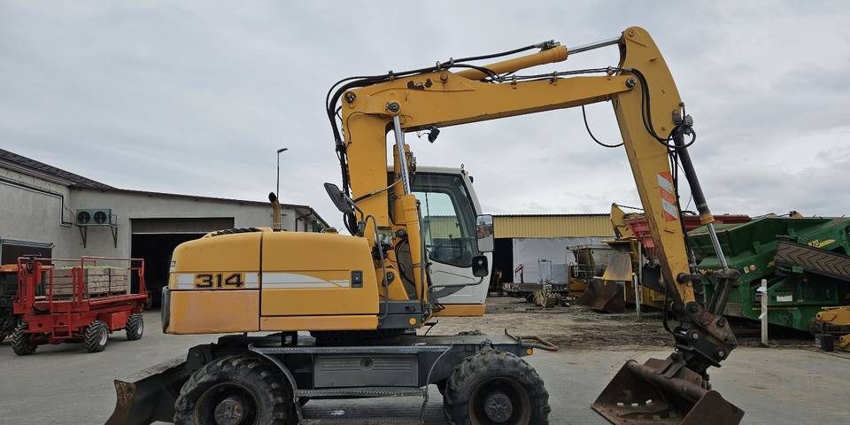 2010 Liebherr A314 wheel excavator, side profile view