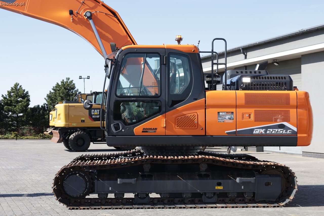 2022 Doosan DX225LC-7 crawler excavator, side profile view 2022 Doosan DX225LC-7 crawler excavator, side profile view