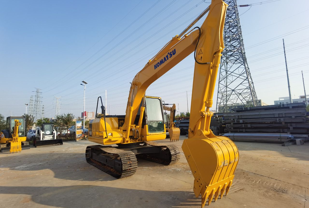 2021 Komatsu PC130-7 mini excavator, front three-quarter view 2021 Komatsu PC130-7 mini excavator, front three-quarter view