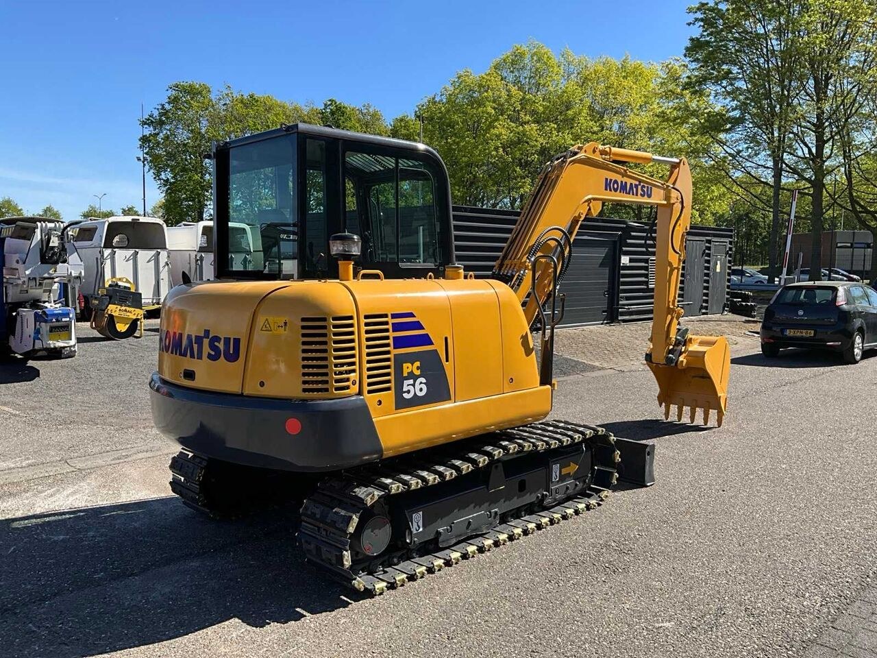 2017 Komatsu PC56-7 mini excavator, rear three-quarter view 2017 Komatsu PC56-7 mini excavator, rear three-quarter view