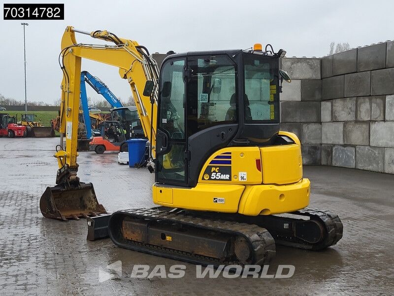 2024 Komatsu PC55MR-5 mini excavator, rear three-quarter view 2024 Komatsu PC55MR-5 mini excavator, rear three-quarter view