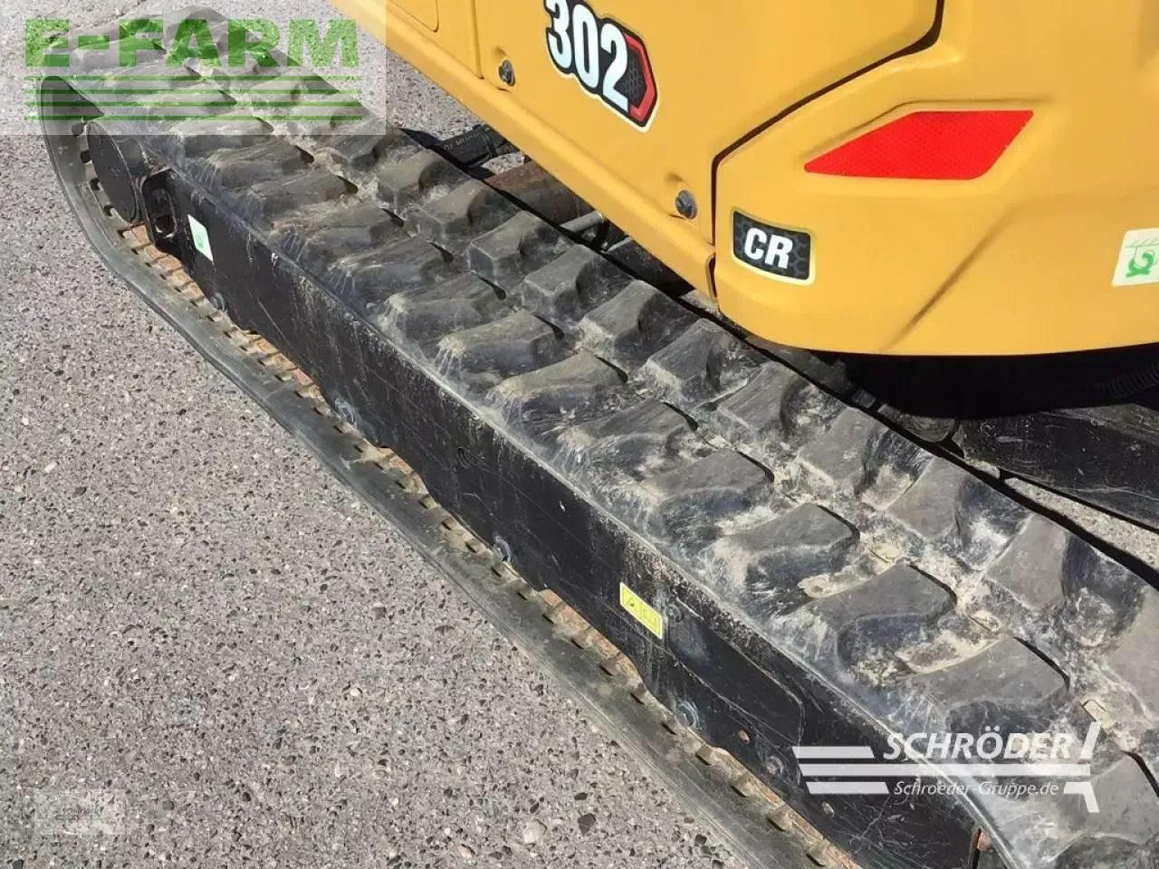 2021 Caterpillar 302CR mini excavator track and side panel detail 2021 Caterpillar 302CR mini excavator track and side panel detail