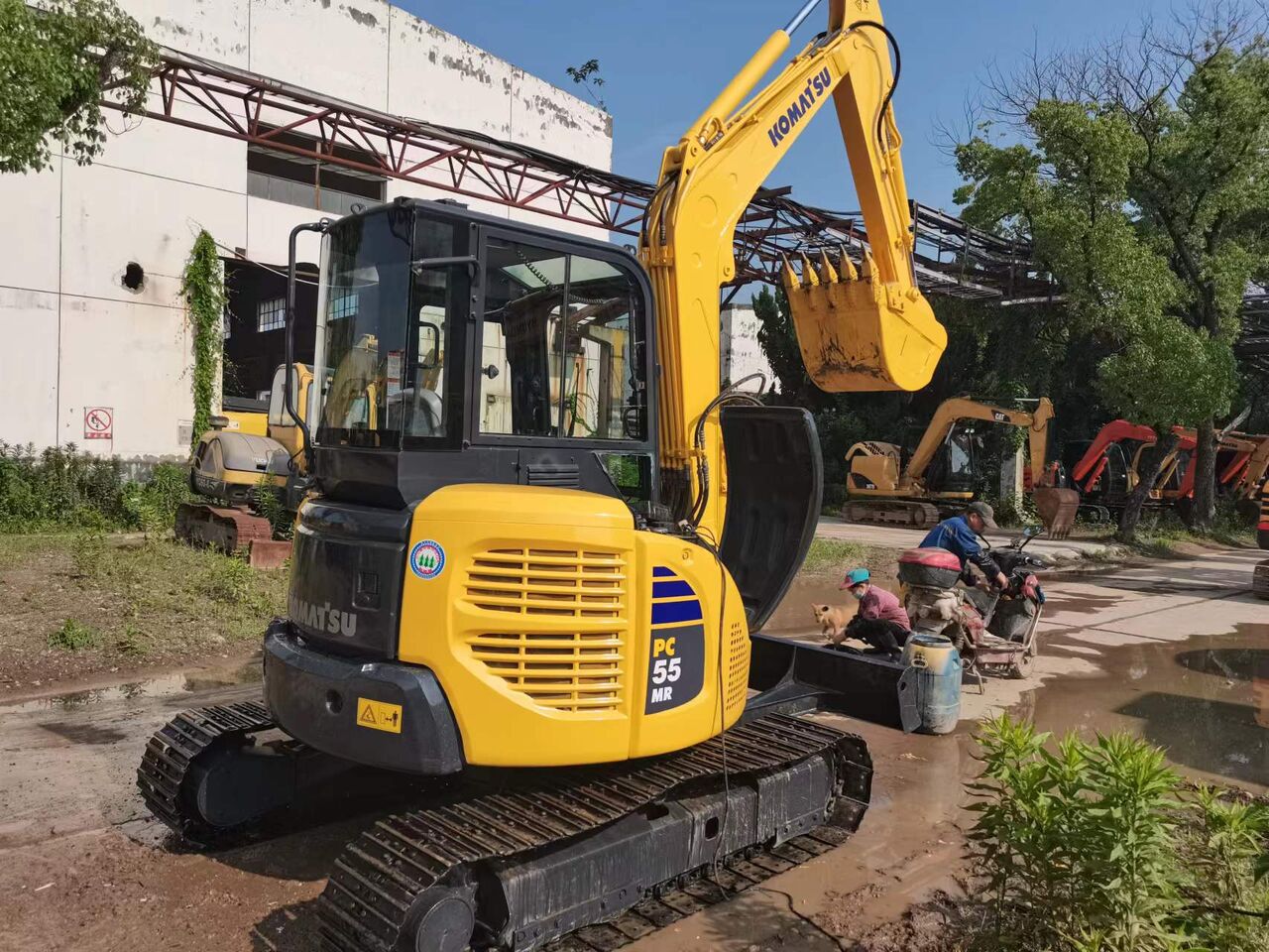 2022 Komatsu PC-55MR mini excavator, rear three-quarter view 2022 Komatsu PC-55MR mini excavator, rear three-quarter view