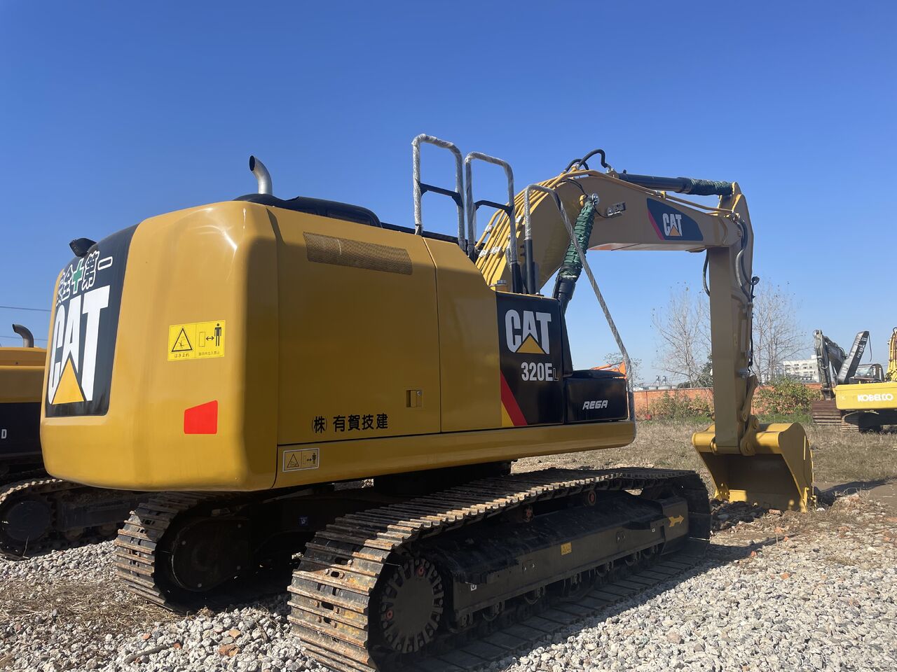 2024 Caterpillar 320EL crawler excavator rear three-quarter view 2024 Caterpillar 320EL crawler excavator rear three-quarter view